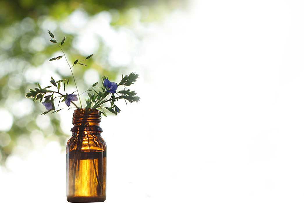 Natural remedies -  space for text. Organic bio alternative medicine bottle.